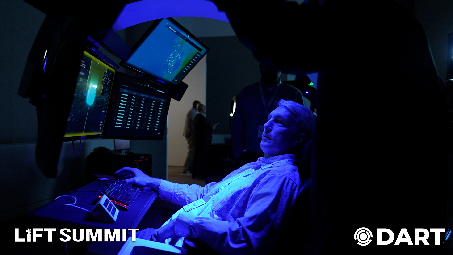 An attendee experiences an immersive flight simulator demo at the 2025 LIFT Summit
